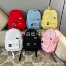 日系书包女韩版大学生高中生校园简约百搭轻便双肩包纯色i背包