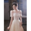 Long, champagne color, mid-length