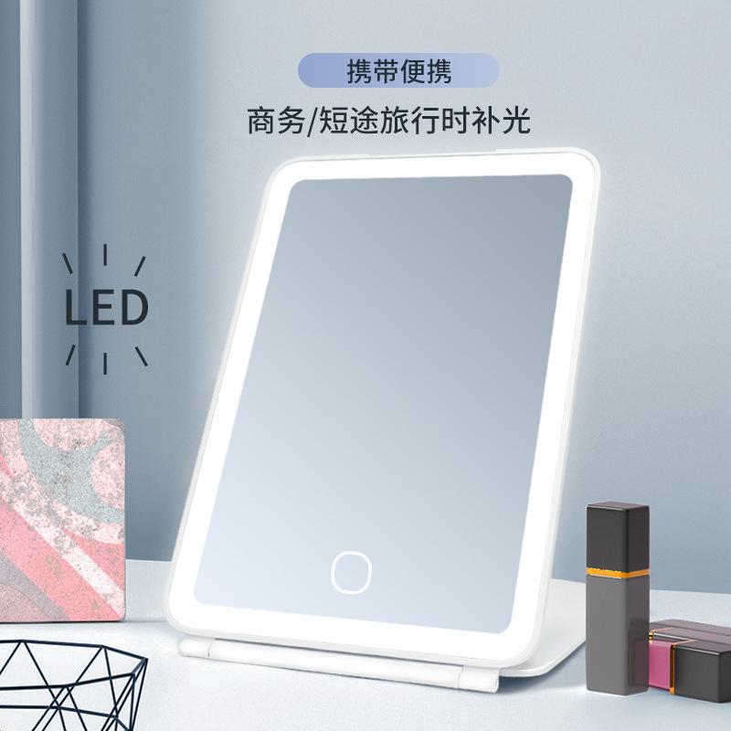 Espejo de maquillaje transfronterizo con luz led luz portátil plegable escritorio dormitorio de estudiantes espejo de maquillaje de belleza inteligente