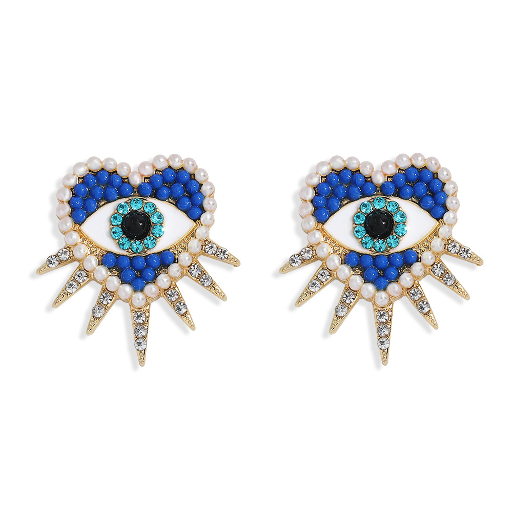 Fashion Demon Eye Heart Diamond Earrings display picture 3