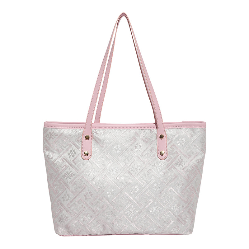 2025 nuevo estilo nacional de diseño de patrón oscuro bolso de mujer gran capacidad versátil bolso de viaje bolso de hombro de moda ligero de lujo