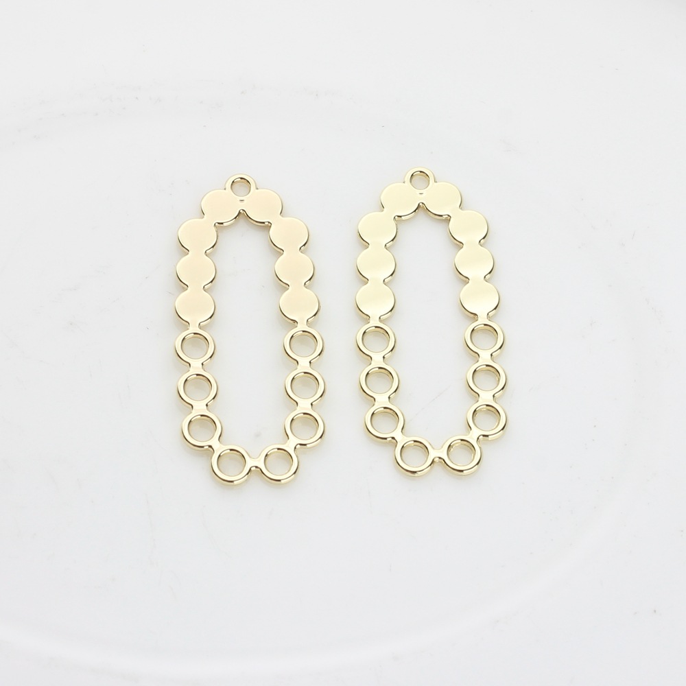 Aleación de estilo coreano irregular hueco oval punto forma colgante accesorios DIY joyería pendientes accesorios material