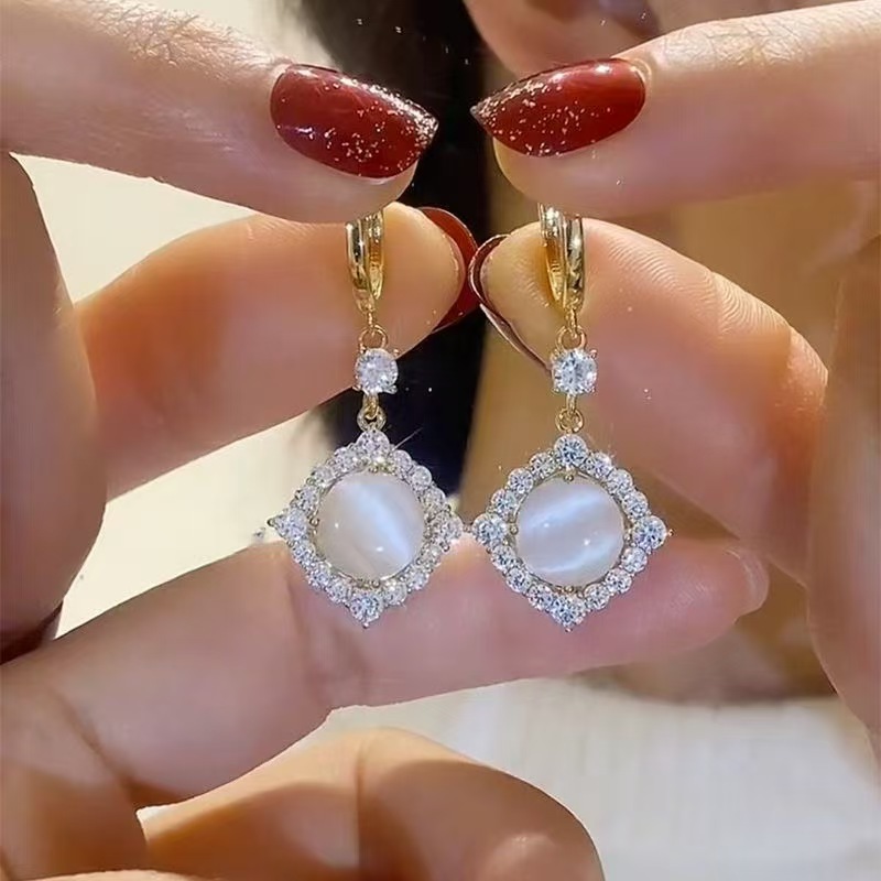 White, square, cat's eye
