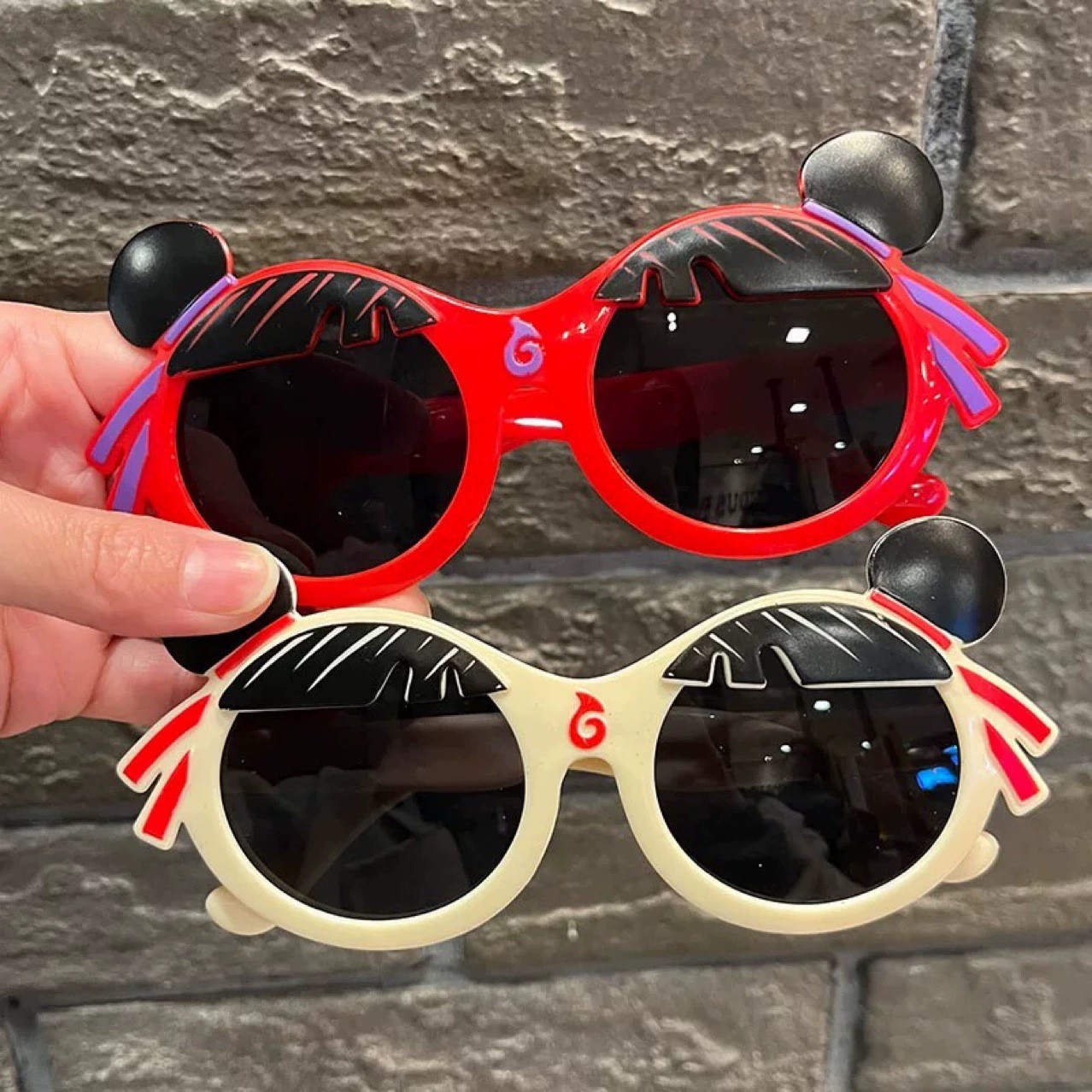 Neto gafas de sol de estilo infantil, bebés de sexo masculino y femenino, gafas de sol de dibujos animados anti-UV de primavera.