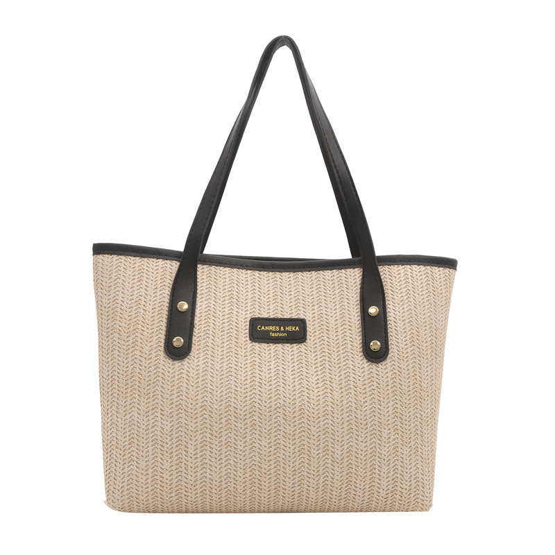 Bolso de paja de gran capacidad para viajeros para mujer 2024 nuevo estilo de moda y estilo occidental, bolso de axilas de color de contraste, bolso de Tote popular de este año