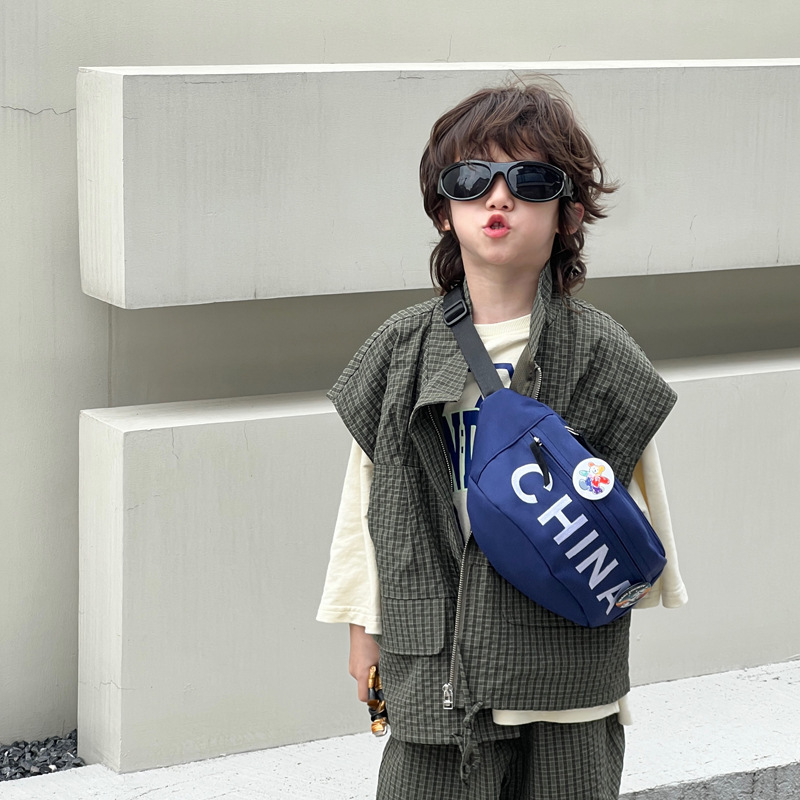Nuevo tipo de bolso infantil estilo coreano de moda letras bolso de mochila para hombres simple de alto valor de belleza bolso de pecho ligero