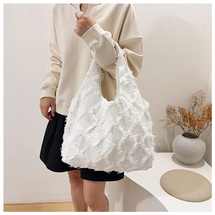 Batik-Rohstoff Creme-Weiß Quaste Canvas Rucksack Schultasche Damen Rucksack Weste Rucksack Großvolumen literarischer Batik-Handwerksstil