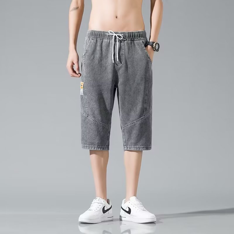 Moda verano mezclilla tendencia de los hombres sueltos rectos tallas grandes pantalones recortados marca de moda de los hombres pantalones medios de 7 puntos estilo fino de verano