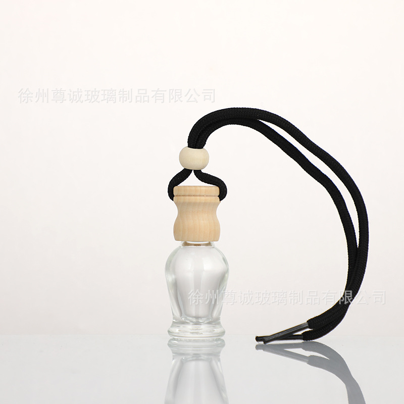 Botella de perfume de cables de automóvil botella vacía botella de perfume de automóvil colgante tapa de madera botella vacía perfumes volátiles al por mayor