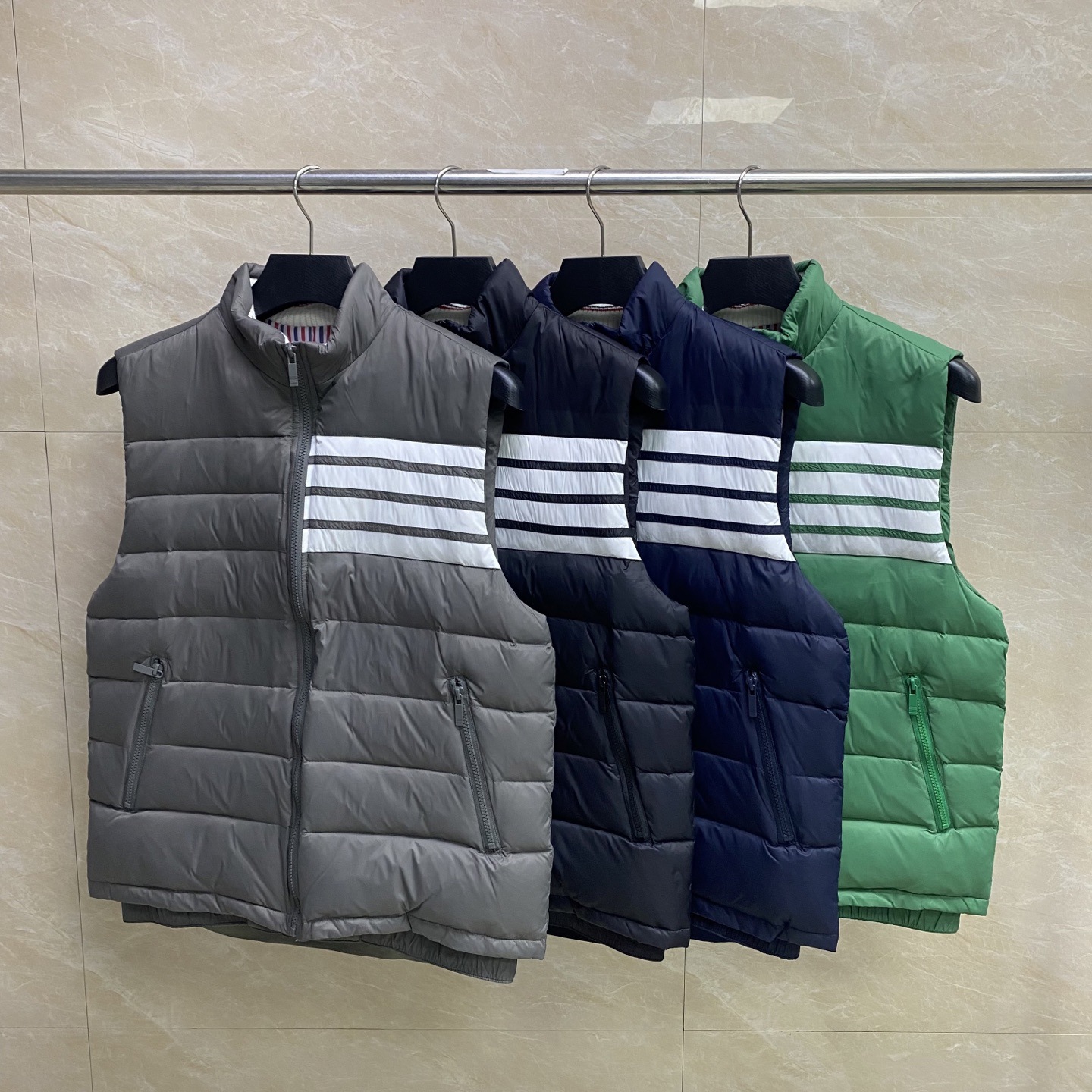 TB factory direct sales of new winter style white duck down vest with four stripes on the chest and stand-up collar, unisex casual and comfortable vest.