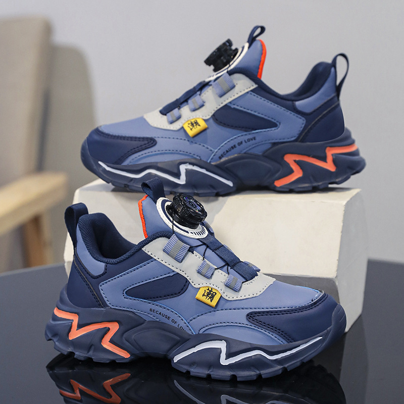 Zapatos infantiles para niños zapatos deportivos primavera y otoño nuevos zapatos de botón impermeable de cuero para niños zapatos de papá mayorista