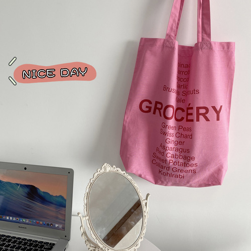 Korean version of sweet and simple pink English portable shoulder bag student shopping portable large capacity shopping bag women's bag