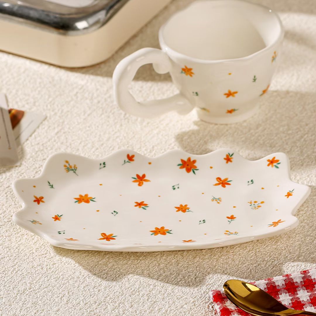 Creativa flor nórdica personalidad taza de plato combinación de taza de cerámica marca regalo de mano taza de té de la tarde taza de café alto valor facial