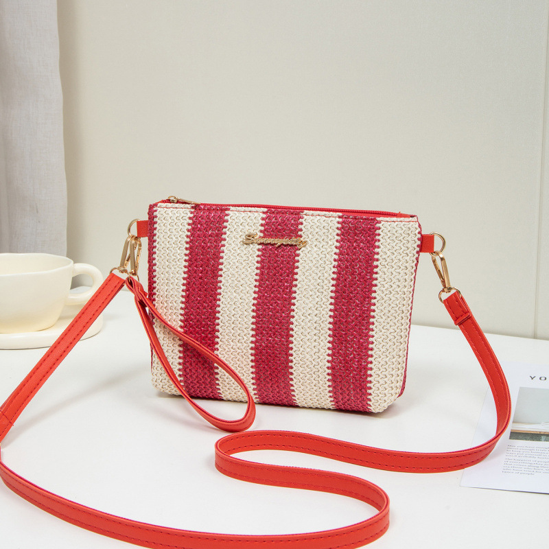 Bolso de verano para mujeres 2025, nuevo estilo de tela tejida bolso de paja de moda bolso de hombro con cámara bolso de mochila un cabello