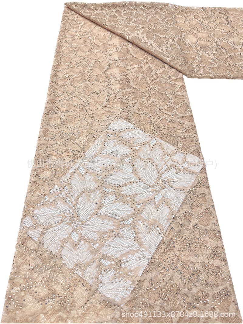 Nuevo hueco flor de encaje fondo tela de perforación caliente pesada cola de pez vestido de boda vestido de noche brindis tela spot