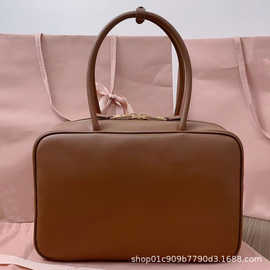 缪家长手柄公手提公文包牛皮商务通勤包保龄球单肩斜挎包手拎头层