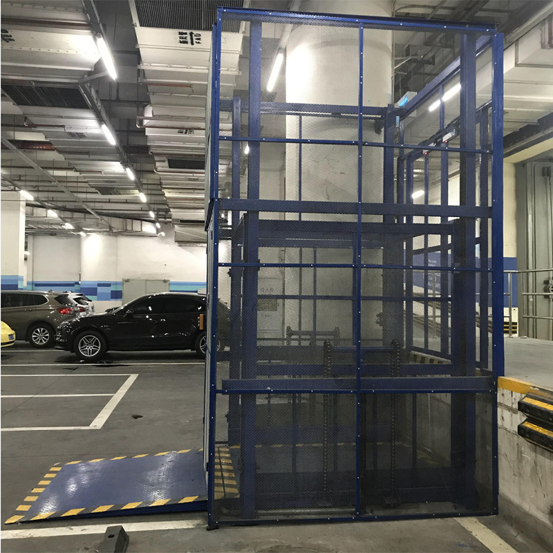 Plataforma elevadora fija de transporte de carga sobre rieles, elevador de carga hidráulico eléctrico para almacén, móvil para carga y descarga