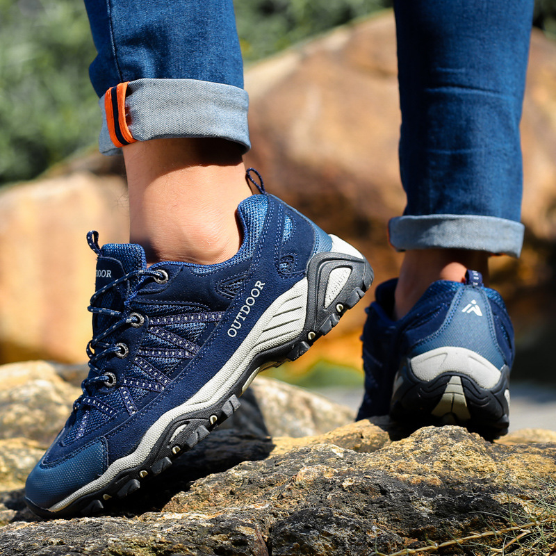 Una pieza de zapatos al aire libre de otoño y invierno para hombres tela de malla transpirable antideslizante pareja zapatos de montaña de montaña zapatos de montaña bajos