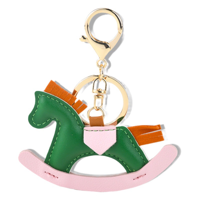 狂ったinsポニーストラップ漫画ロッキング馬皮質ストラップ手作り革バッグストラップ自動車キーホルダー