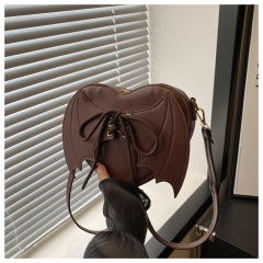 ネットの赤い新型の越境の卸売りの包みのバンドの設計のコウモリの翼の包みのハロウィンのおかしな女性の肩の斜めなバッグ