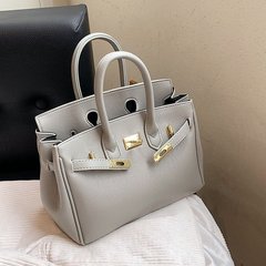 女性のための高級質感ハンドバッグ 2025 夏の新しいファッションプラチナバッグ大容量シングルショルダークロスボディトートバッグ