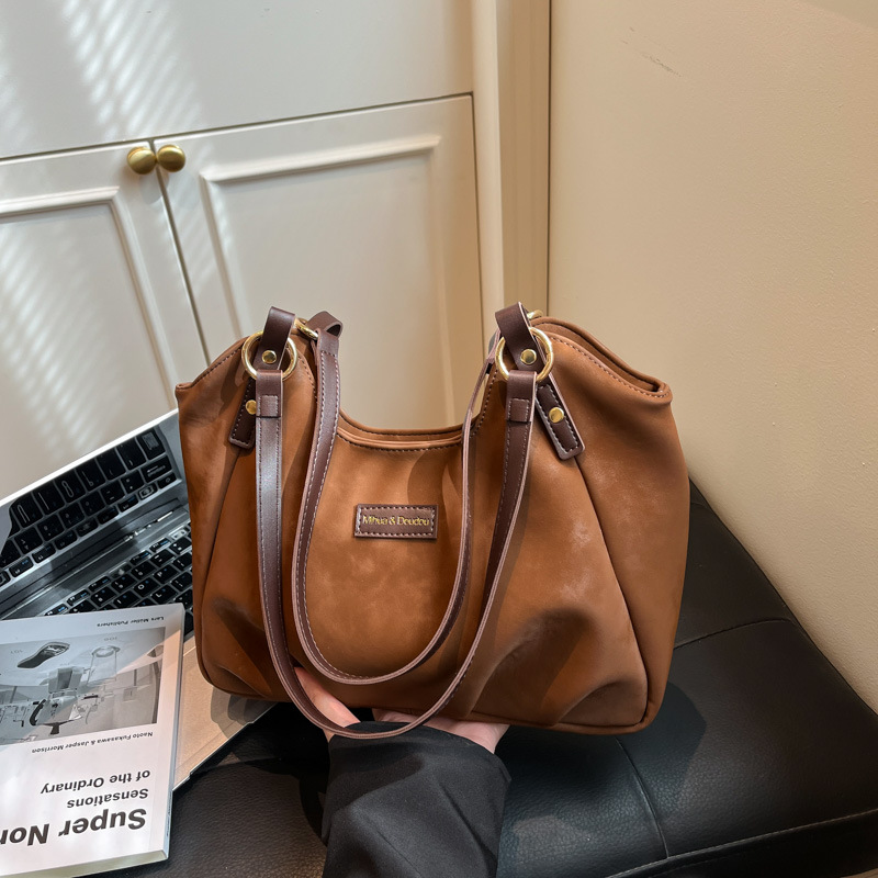 Bolsa de mano de peluche retro de gamuza para mujeres 2025 nueva moda versátil bolso de viaje tote bolso de hombro casual braza