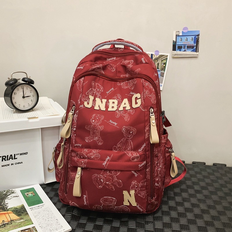 减负书包男生高中生大容量双肩包初中女生印花大学生休闲旅行背包|undefined
