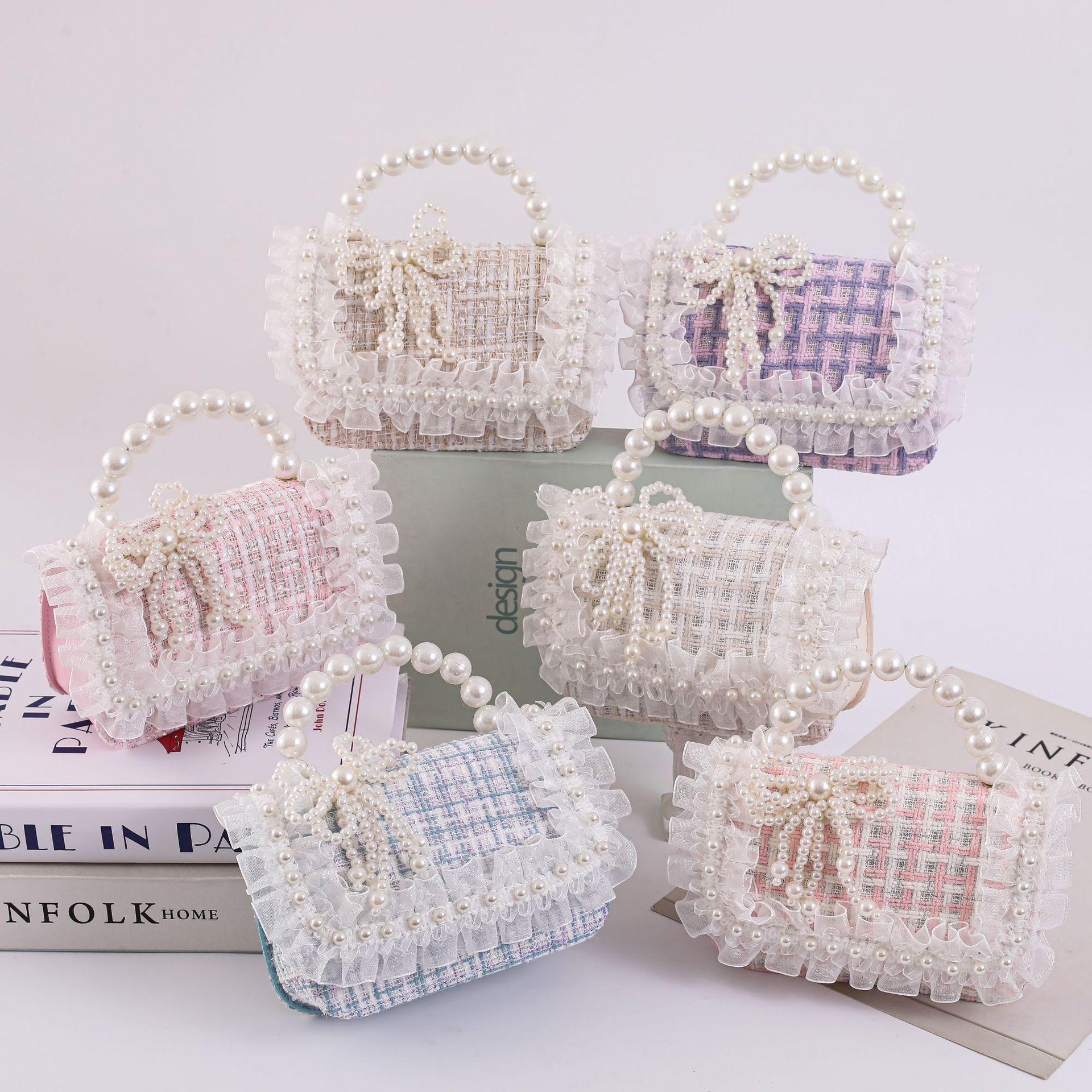 Bolsos para niños niñas 2025 bolsos de moda de hombro de dibujos animados arco de perla princesa mochila mini bolso de cambio