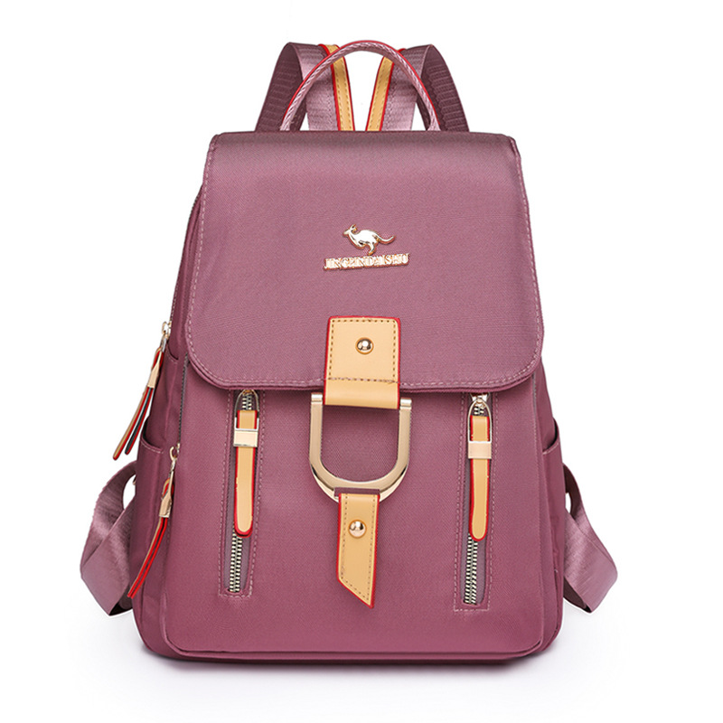 2024 nueva mochila de nailon para mujer de color de contraste tendencia de moda mochila de viaje ligera al por mayor al aire libre de gran capacidad