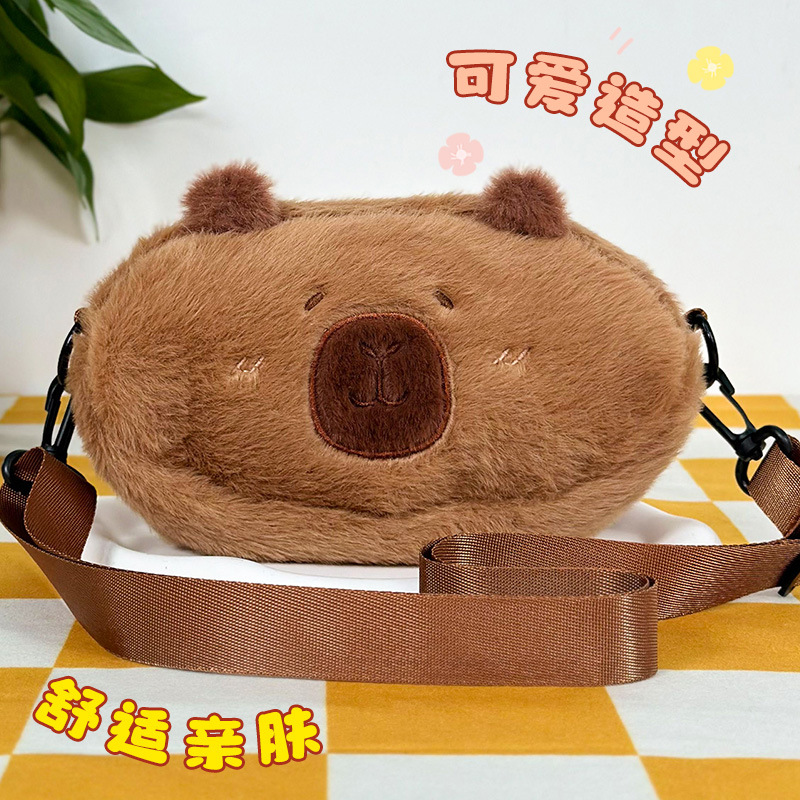 Transfronterizo Kapibara bolsas de peluche dibujos animados portátiles muñecas lindas juegos de ciudad tijeras agarrar bolsas de muñecas
