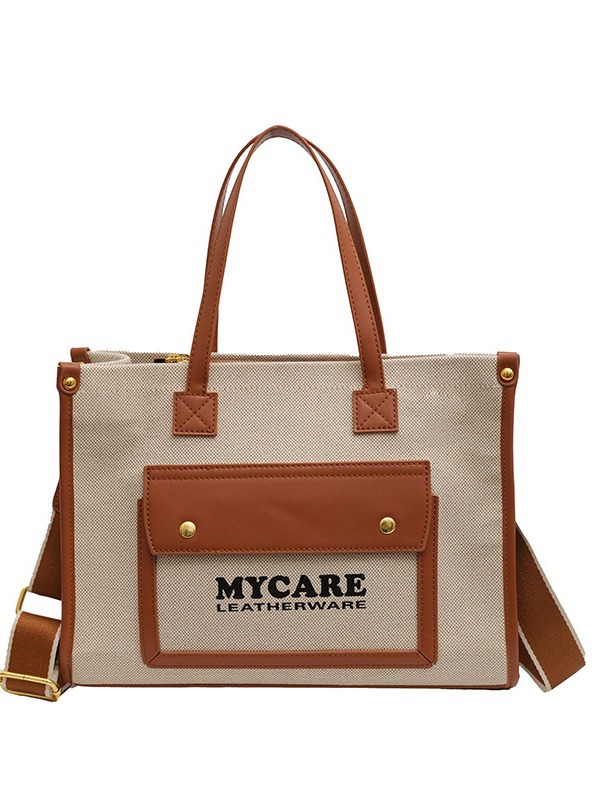 Bolso de lona de gran capacidad para mujeres 2024 nueva moda color contrastante empalme mochila de hombro simple bolsa de mano casual