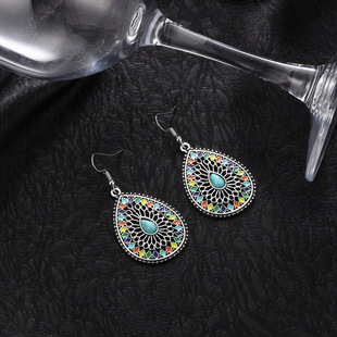 Cross-border hot selling vintage bohemian turquoise drop-shaped carved hollow colorful oil dripping earrings earrings wholesale