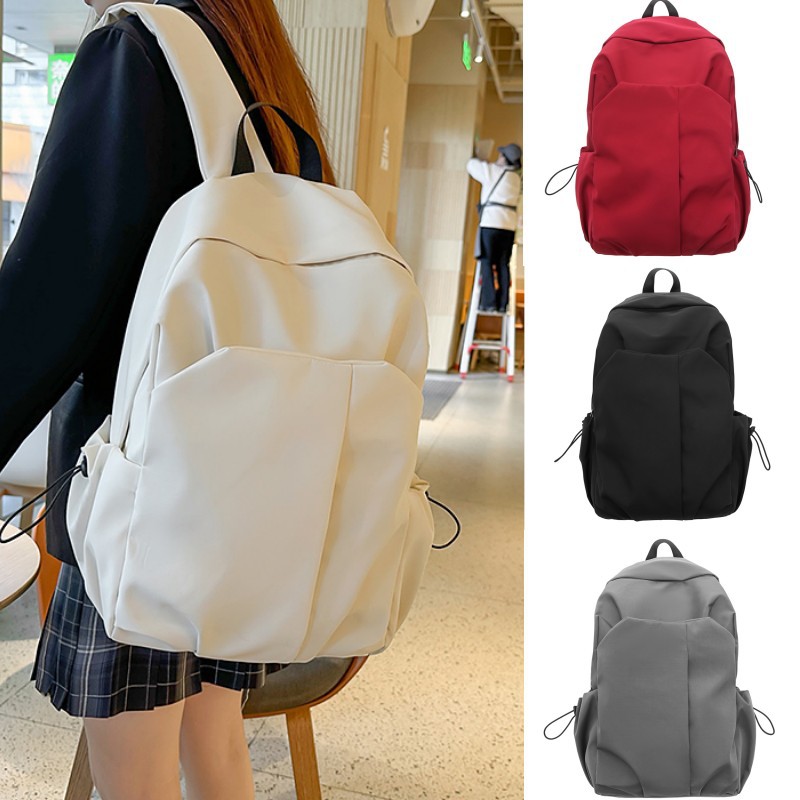 Nueva mochila de alta capacidad de la moda fresca de color sólido bolsas de viaje de estudiantes de secundaria secundaria ocio simple mochila de computadora