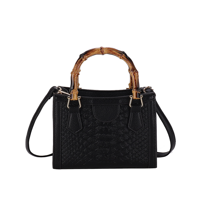 Europa y los Estados Unidos retro bolsos transfronterizos mujeres 2024 nueva moda simple bolsos de mano casuales cocodrilo mochila pequeña