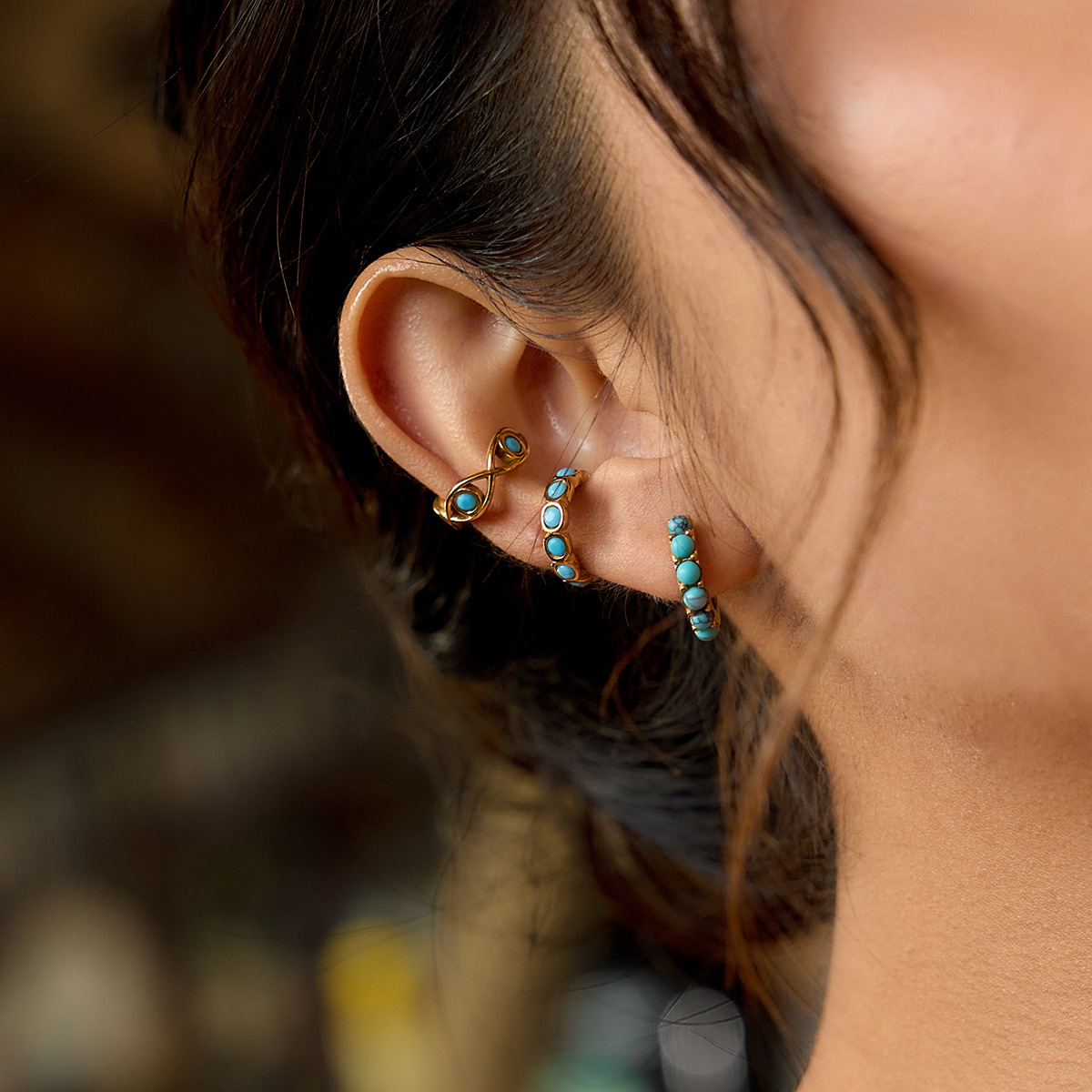 Wanxing azul turquesa diablo ojo orejas clips para mujeres retro europeo y americano sin agujeros de diseño de orejas orejas orejas de acero de titanio de oro 18K