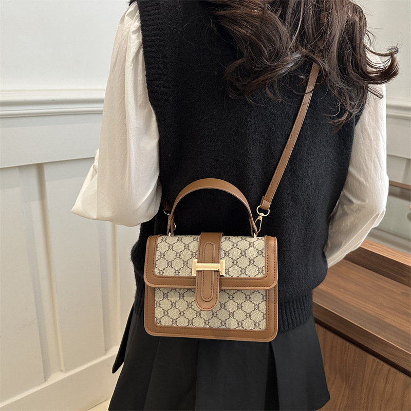 2025 nueva moda simple de alto valor de cara bolso de hombro de moda retrógrada impresión de personalidad bolso de viaje portátil pequeño