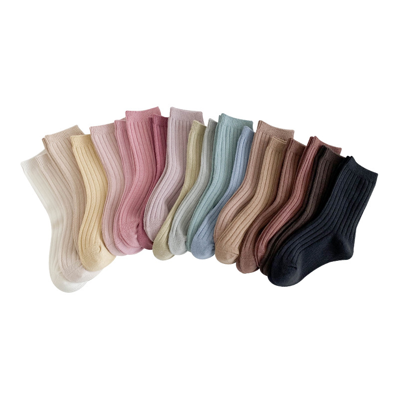 Calcetines para niños primavera y otoño moda de una sola pieza calcetines de media pantorrilla de color sólido para niños y niñas calcetines de bebé de color liso de doble aguja