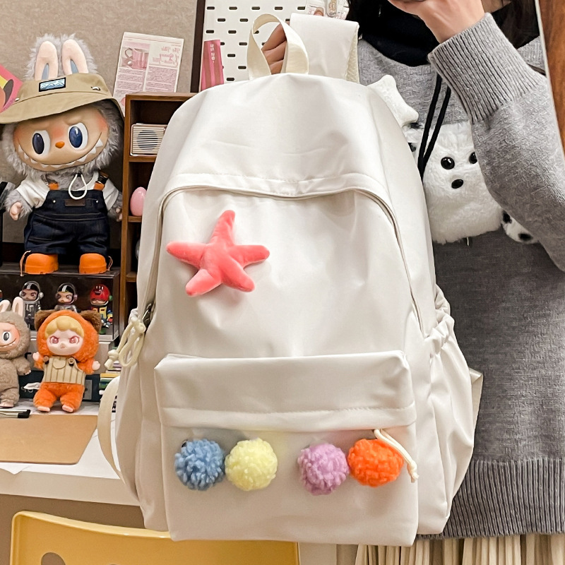 Mochila escolar femenina japonesa simple pequeña mochila fresca para estudiantes color puro todo fósforo casual estilo universitario niña mochila de viaje