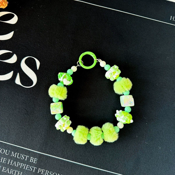 Cheese plush string green (random hand-painted bead pattern)