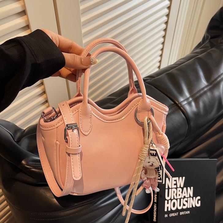 Bolso de tendencia extranjera, bolso de mano de mujer 2025, nuevo estilo de moda, bolso de cubo de hombro casual, mochila de textura de alta calidad