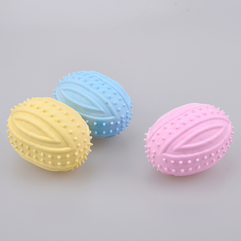 Amazon nuevo TPR espuma leche sabor púas sólido rugby mascota juguete mordedura juguete molar