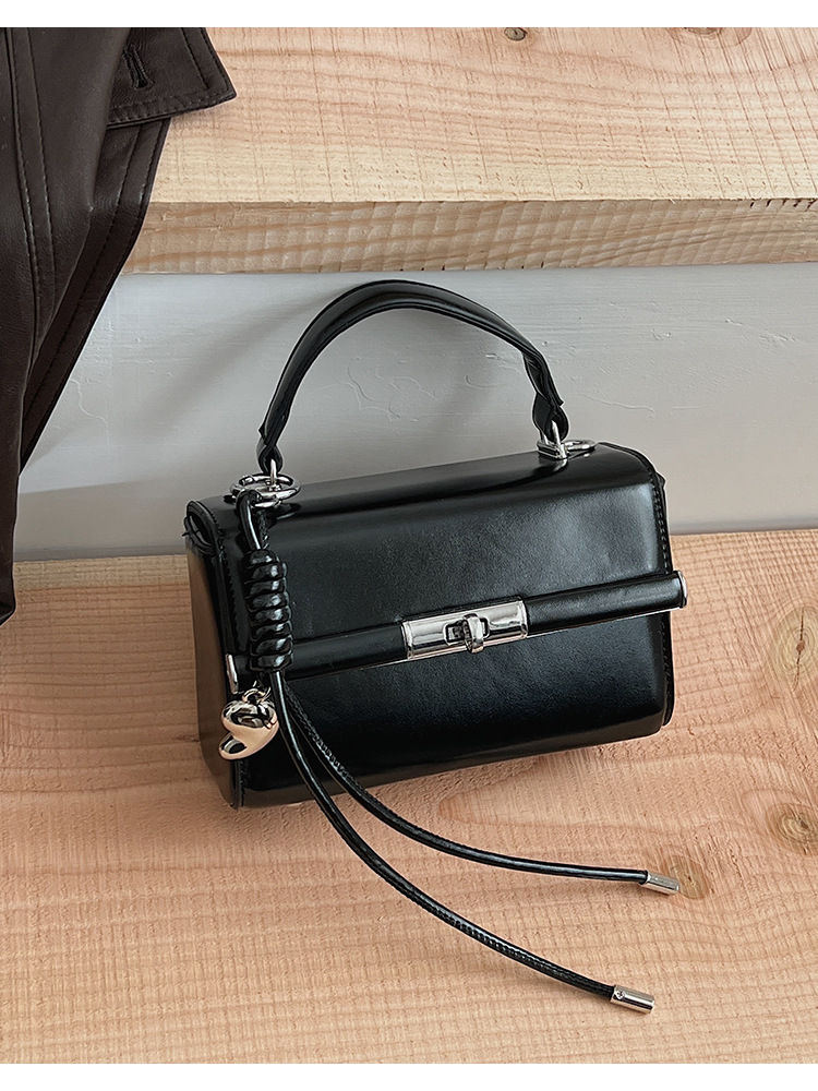 Bolso de mano de alta sensación para mujeres 2026 nuevo bolso cuadrado ligero de textura de lujo estilo coreano nicho bolso de hombro de mujer