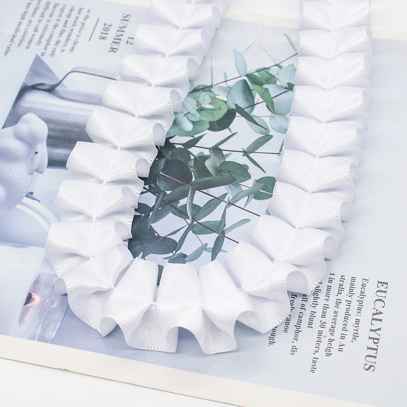 Fabricantes al por mayor de 2,5 cm de ancho doble poliéster plegado borde de lótus cinta DIY accesorios de ropa hecha a mano decoración cinta de encaje