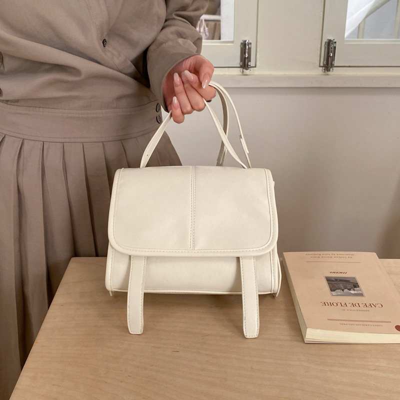 Bolsa de correo de alto valor, bolso de hombro de moda para mujeres 2026 nuevo simple mochila casual retro bolso de viaje