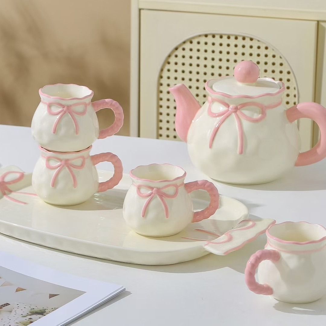 Personalidad creativa de alto valor facial arco hervidor de agua fría conjunto de tazas de cerámica acuario conjunto de nicho regalo de cumpleaños