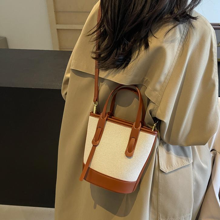 Bolsa de balde de color de contraste popular de este año 2026 nuevo bolso de hombro universal bolso de viaje simple de alta calidad