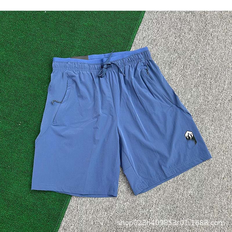 Fabricantes al por mayor de pantalones cortos deportivos para hombres de velocidad de hielo seco maratón de verano delgado entrenamiento de acondicionamiento físico pantalones de moda