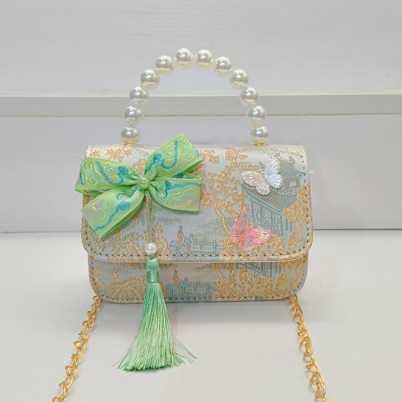 Bolsa de arco de estilo nacional de la princesa bolso de perla bolso de cadena bolso cuadrado bolso accesorios de ropa china para niños regalos de vacaciones de niñas