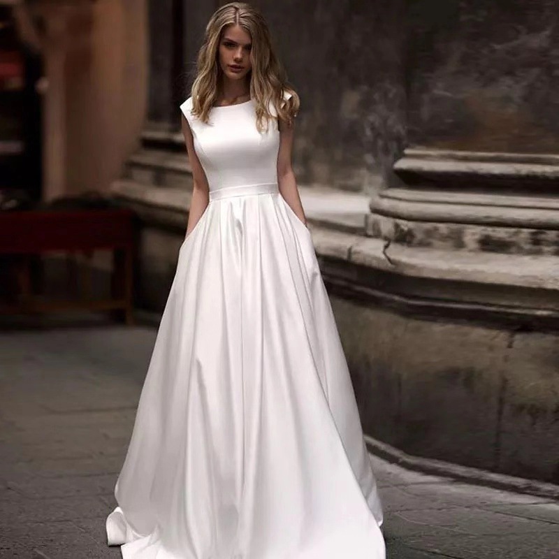 Europa y los Estados Unidos comercio exterior vestido de boda verano 2026 nueva novia de cola sexy delgada satén simple moda de viaje