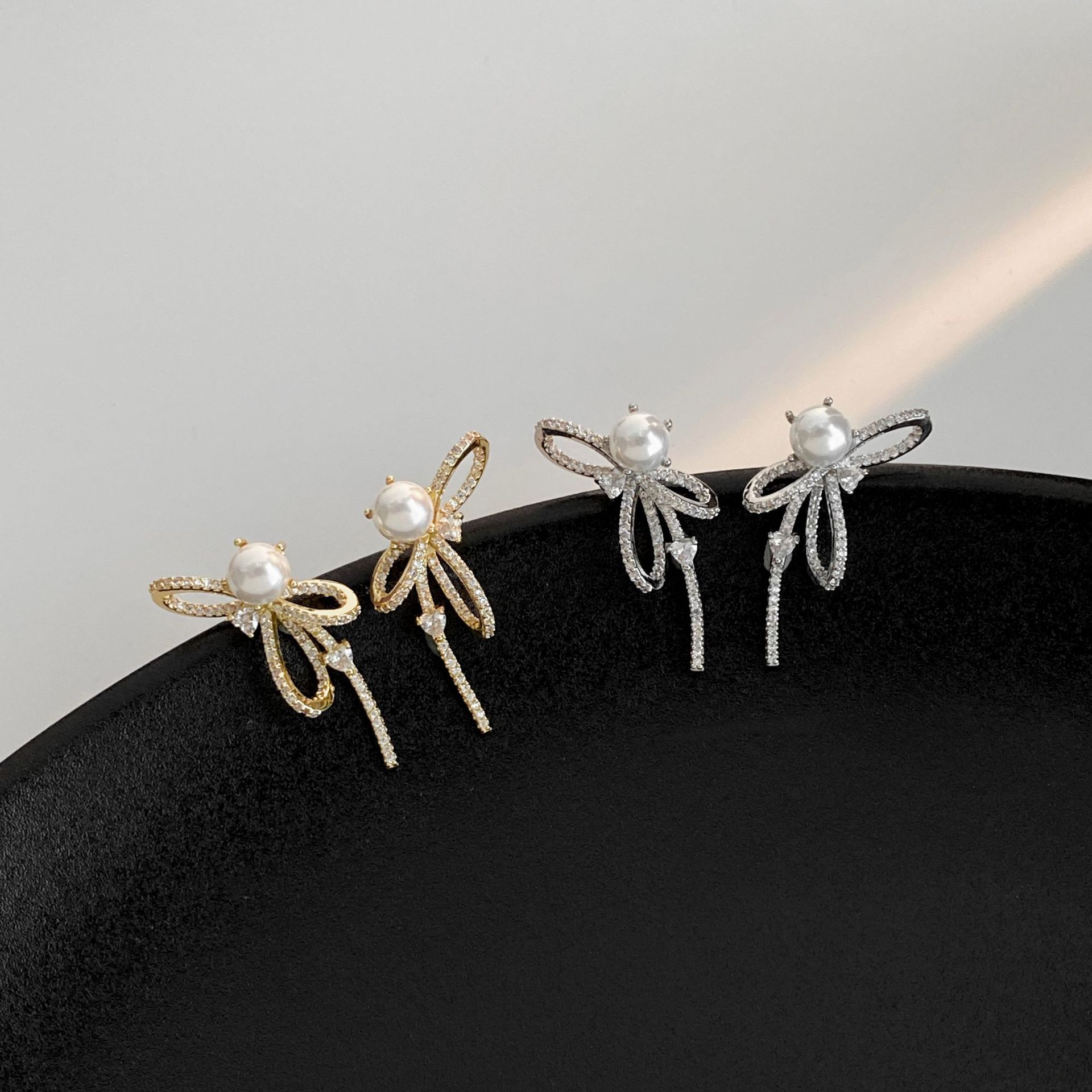 Long sophisticated design earrings with bow pearl heart shaped